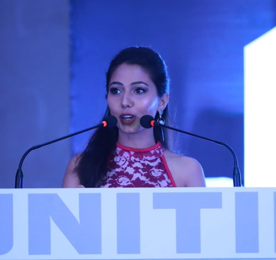 Dhwani Rao opening a corporate summit